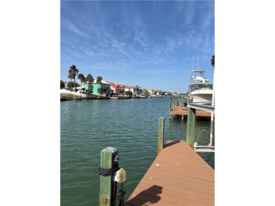Charming waterfront lot in Port A's premier canal community of on Palmilla Beach Golf Club in Texas - for sale on GolfHomes.com, golf home, golf lot
