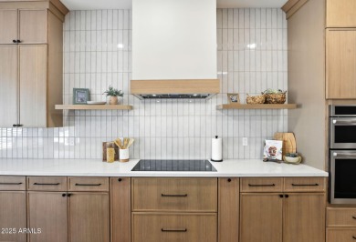 Modern Mountain Living Reimagined.  Discover elevated luxury in on Estrella Mountain Ranch Golf Course in Arizona - for sale on GolfHomes.com, golf home, golf lot