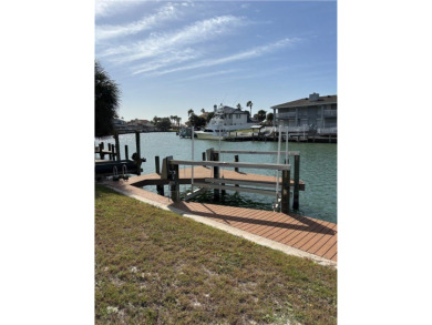 Charming waterfront lot in Port A's premier canal community of on Palmilla Beach Golf Club in Texas - for sale on GolfHomes.com, golf home, golf lot