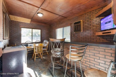 Welcome to this delightful classic downtown Coeur d'Alene home on Coeur D Alene Resort Golf Course in Idaho - for sale on GolfHomes.com, golf home, golf lot