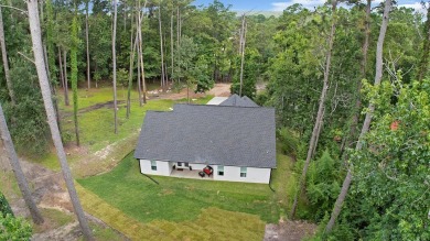 Enjoy peaceful living with golf course views in this beautifully on Rayburn Country Club in Texas - for sale on GolfHomes.com, golf home, golf lot
