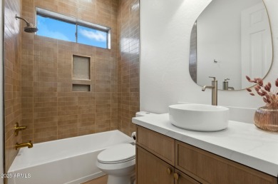 Modern Mountain Living Reimagined.  Discover elevated luxury in on Estrella Mountain Ranch Golf Course in Arizona - for sale on GolfHomes.com, golf home, golf lot