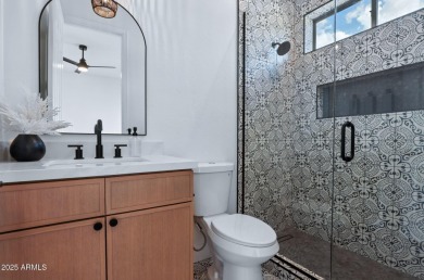 Modern Mountain Living Reimagined.  Discover elevated luxury in on Estrella Mountain Ranch Golf Course in Arizona - for sale on GolfHomes.com, golf home, golf lot