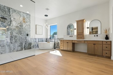 Modern Mountain Living Reimagined.  Discover elevated luxury in on Estrella Mountain Ranch Golf Course in Arizona - for sale on GolfHomes.com, golf home, golf lot