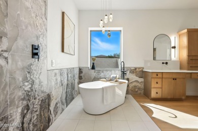 Modern Mountain Living Reimagined.  Discover elevated luxury in on Estrella Mountain Ranch Golf Course in Arizona - for sale on GolfHomes.com, golf home, golf lot