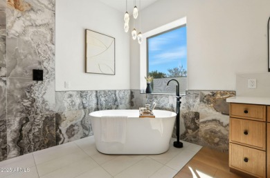 Modern Mountain Living Reimagined.  Discover elevated luxury in on Estrella Mountain Ranch Golf Course in Arizona - for sale on GolfHomes.com, golf home, golf lot