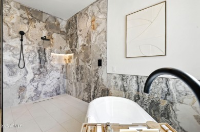 Modern Mountain Living Reimagined.  Discover elevated luxury in on Estrella Mountain Ranch Golf Course in Arizona - for sale on GolfHomes.com, golf home, golf lot