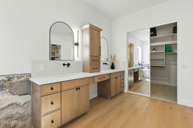 Modern Mountain Living Reimagined.  Discover elevated luxury in on Estrella Mountain Ranch Golf Course in Arizona - for sale on GolfHomes.com, golf home, golf lot