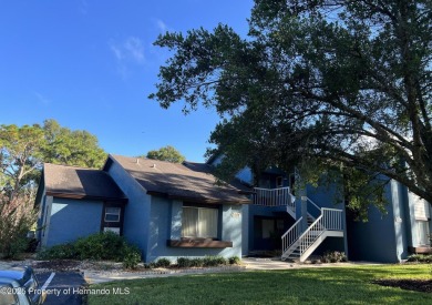 Nice, first floor unit, 2/2 with enclosed porch that overlooks on Heather Golf and Country Club in Florida - for sale on GolfHomes.com, golf home, golf lot