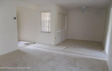 Nice, first floor unit, 2/2 with enclosed porch that overlooks on Heather Golf and Country Club in Florida - for sale on GolfHomes.com, golf home, golf lot