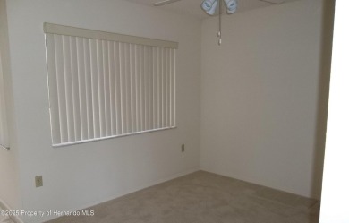 Nice, first floor unit, 2/2 with enclosed porch that overlooks on Heather Golf and Country Club in Florida - for sale on GolfHomes.com, golf home, golf lot
