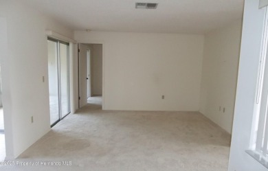 Nice, first floor unit, 2/2 with enclosed porch that overlooks on Heather Golf and Country Club in Florida - for sale on GolfHomes.com, golf home, golf lot