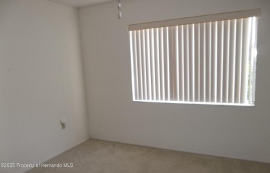 Nice, first floor unit, 2/2 with enclosed porch that overlooks on Heather Golf and Country Club in Florida - for sale on GolfHomes.com, golf home, golf lot