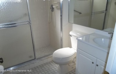 Nice, first floor unit, 2/2 with enclosed porch that overlooks on Heather Golf and Country Club in Florida - for sale on GolfHomes.com, golf home, golf lot