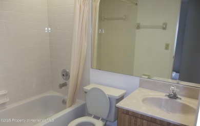Nice, first floor unit, 2/2 with enclosed porch that overlooks on Heather Golf and Country Club in Florida - for sale on GolfHomes.com, golf home, golf lot