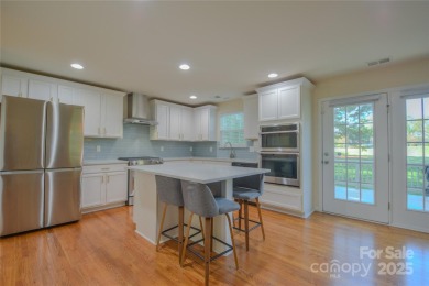 Welcome to 136 Wood Duck Loop - Set on a private lot backing up on Mallard Head Country Club in North Carolina - for sale on GolfHomes.com, golf home, golf lot