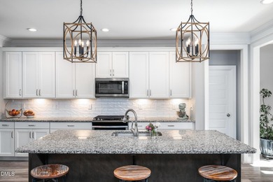 Set at the end of a cul-de-sac on the golf course in the on Chapel Ridge Golf Club in North Carolina - for sale on GolfHomes.com, golf home, golf lot