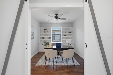 Prepare to be impressed by this STUNNING pool home on a on Links At Greenfield Plantation in Florida - for sale on GolfHomes.com, golf home, golf lot