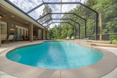 Halifax Plantation pool home. Immaculately maintained. Built by on Halifax Plantation Golf Club in Florida - for sale on GolfHomes.com, golf home, golf lot