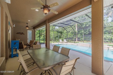 Halifax Plantation pool home. Immaculately maintained. Built by on Halifax Plantation Golf Club in Florida - for sale on GolfHomes.com, golf home, golf lot