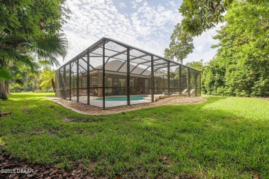 Halifax Plantation pool home. Immaculately maintained. Built by on Halifax Plantation Golf Club in Florida - for sale on GolfHomes.com, golf home, golf lot