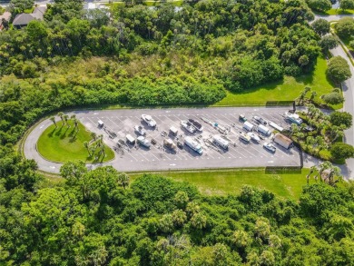 Beautiful, lake front buildable lot in the highly desirable on Grand Haven Golf Club in Florida - for sale on GolfHomes.com, golf home, golf lot