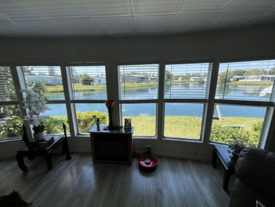 Spacious Lake-Front Garage Home with best view of the lake in on Vista Plantation Golf Club in Florida - for sale on GolfHomes.com, golf home, golf lot