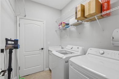 Prepare to be impressed by this STUNNING pool home on a on Links At Greenfield Plantation in Florida - for sale on GolfHomes.com, golf home, golf lot