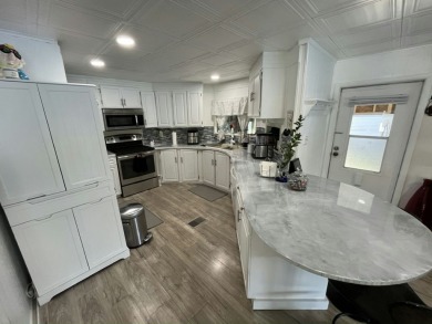 Spacious Lake-Front Garage Home with best view of the lake in on Vista Plantation Golf Club in Florida - for sale on GolfHomes.com, golf home, golf lot