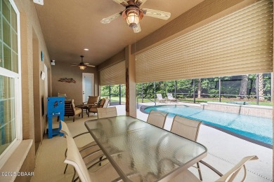 Halifax Plantation pool home. Immaculately maintained. Built by on Halifax Plantation Golf Club in Florida - for sale on GolfHomes.com, golf home, golf lot