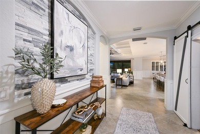 Prepare to be impressed by this STUNNING pool home on a on Links At Greenfield Plantation in Florida - for sale on GolfHomes.com, golf home, golf lot