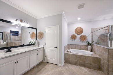 Prepare to be impressed by this STUNNING pool home on a on Links At Greenfield Plantation in Florida - for sale on GolfHomes.com, golf home, golf lot