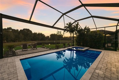 Prepare to be impressed by this STUNNING pool home on a on Links At Greenfield Plantation in Florida - for sale on GolfHomes.com, golf home, golf lot