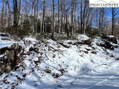 Uphill sloping lot in growing area close to Buckeye Recreation on Beech Mountain Club in North Carolina - for sale on GolfHomes.com, golf home, golf lot