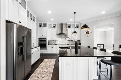 EXQUISITE GOLF-FRONT ESTATE IN LAKE NONA - FULLY UPGRADED on Eagle Creek Golf Club in Florida - for sale on GolfHomes.com, golf home, golf lot