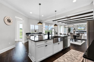 EXQUISITE GOLF-FRONT ESTATE IN LAKE NONA - FULLY UPGRADED on Eagle Creek Golf Club in Florida - for sale on GolfHomes.com, golf home, golf lot