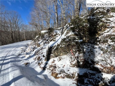 Uphill sloping lot in growing area close to Buckeye Recreation on Beech Mountain Club in North Carolina - for sale on GolfHomes.com, golf home, golf lot