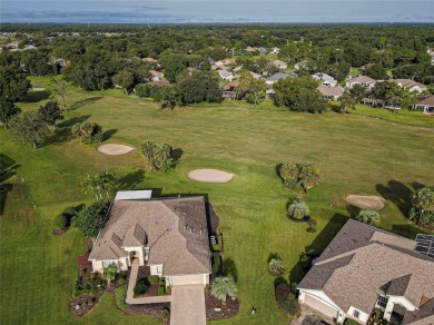 GOLF COURSE WITH GREAT VIEWS AND A STUNNING HOME LOCATED ON A on Eagle Ridge At Spruce Creek Country Club in Florida - for sale on GolfHomes.com, golf home, golf lot