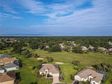 GOLF COURSE WITH GREAT VIEWS AND A STUNNING HOME LOCATED ON A on Eagle Ridge At Spruce Creek Country Club in Florida - for sale on GolfHomes.com, golf home, golf lot