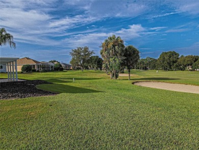 GOLF COURSE WITH GREAT VIEWS AND A STUNNING HOME LOCATED ON A on Eagle Ridge At Spruce Creek Country Club in Florida - for sale on GolfHomes.com, golf home, golf lot