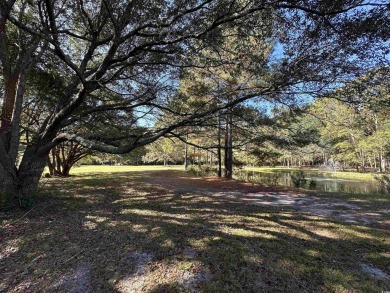 This 20 acre property is one of the last multi-acre tracts in on Players Course At Wyboo Plantation in South Carolina - for sale on GolfHomes.com, golf home, golf lot