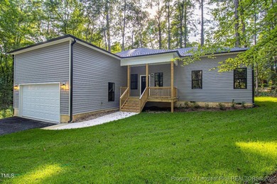 Come see this brand-new 3-bed, 2-bath custom home inside the on Carolina Trace Country Club in North Carolina - for sale on GolfHomes.com, golf home, golf lot