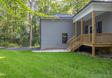 Come see this brand-new 3-bed, 2-bath custom home inside the on Carolina Trace Country Club in North Carolina - for sale on GolfHomes.com, golf home, golf lot