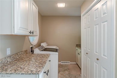 This beautifully maintained one-owner home is nestled in The on The Mayfield Sandridge Club in Ohio - for sale on GolfHomes.com, golf home, golf lot