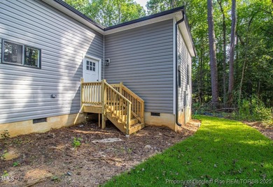 Come see this brand-new 3-bed, 2-bath custom home inside the on Carolina Trace Country Club in North Carolina - for sale on GolfHomes.com, golf home, golf lot