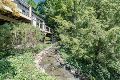 This beautifully maintained one-owner home is nestled in The on The Mayfield Sandridge Club in Ohio - for sale on GolfHomes.com, golf home, golf lot