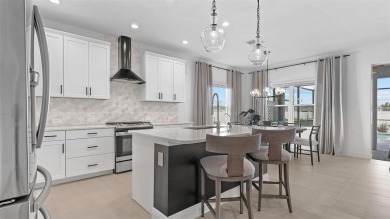 Pool home ~ nestled within the coveted Windward community in on The Founders Golf Club in Florida - for sale on GolfHomes.com, golf home, golf lot