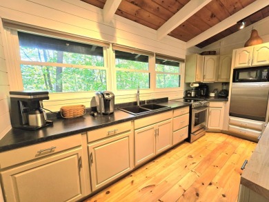 Welcome to your perfect cabin in the woods in Hide A-Way Hills! on Hide-A-Way Hills Golf Club in Ohio - for sale on GolfHomes.com, golf home, golf lot