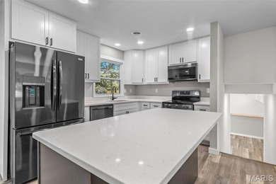Completely renovated from top to bottom, this 4-bedroom, 3-bath on Terre Du Lac Golf and Country Club in Missouri - for sale on GolfHomes.com, golf home, golf lot