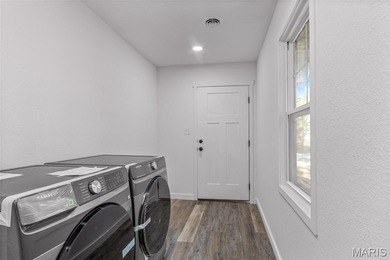 Completely renovated from top to bottom, this 4-bedroom, 3-bath on Terre Du Lac Golf and Country Club in Missouri - for sale on GolfHomes.com, golf home, golf lot